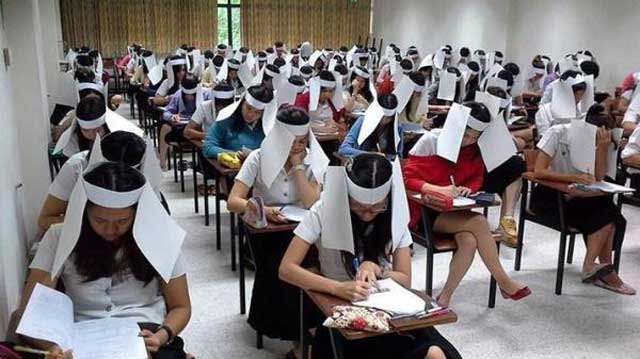 Anti-cheating hats. Author : Scott R. Franklin, Ph.D. Creative Commons Attribution ShareAlike 3.0. link: http://c2.staticflickr.com/4/3884/14584798748_f1e507ff6c_b.jpg